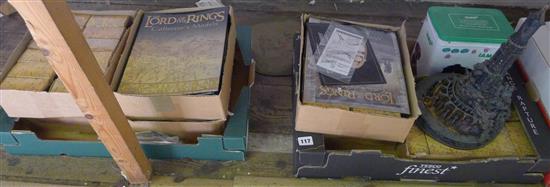 Collection of Lord of the Rings figurines and a model of Baudur-Dur